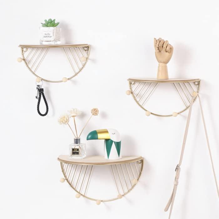Golden D shape wall mounted hooks with floating shelf and wooden hooks for home organization by Carmine Athena