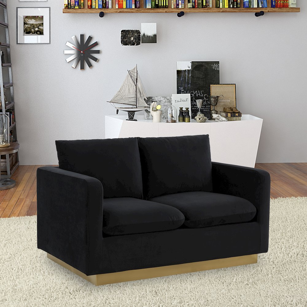 Nervo modern mid-century velvet loveseat with gold frame, upholstered seating and sleek stylish design in a contemporary living room setting