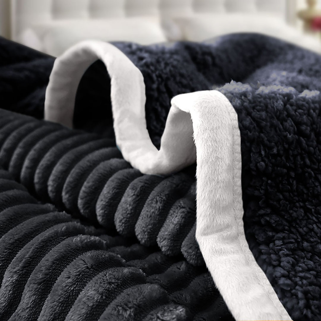 Start2Finish SOGA 2X black throw blanket for home decor, soft fabric with woven texture draped on a cozy sofa.