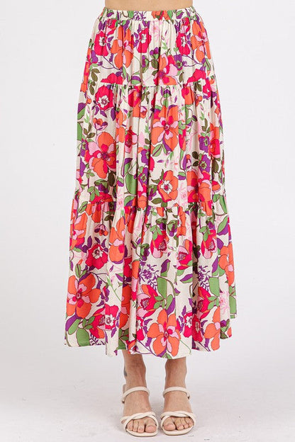Jade Icarus Mittoshop flower print elastic waist tiered skirt, shown in a vibrant floral pattern with a flowing, layered design.