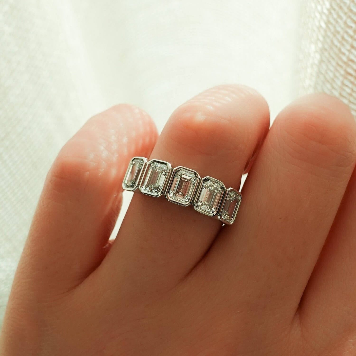 Start2Finish 14k gold lab-grown diamond band featuring five emerald cut stones set in a bezel setting.