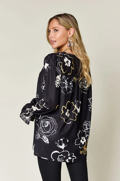 Printed flounce sleeve blouse from Pear Daisy, featuring a stylish design perfect for casual or semi-formal wear.