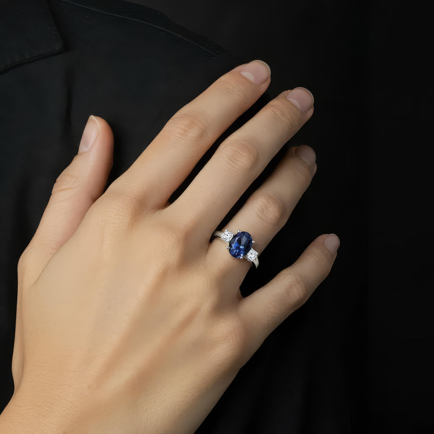 AGI Certified 2.00 CTW Oval Blue Sapphire Diamond 3 Stone Ring in 14k white gold over sterling, featuring three sparkling stones.