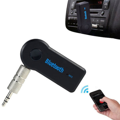 Fuchsia Molly HiFi Bluetooth music receiver connected to audio equipment, compact device with blue indicator light