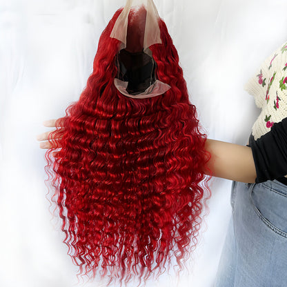 Red deep wave human hair wig on a mannequin head, showcasing Carmine Juneberry&
