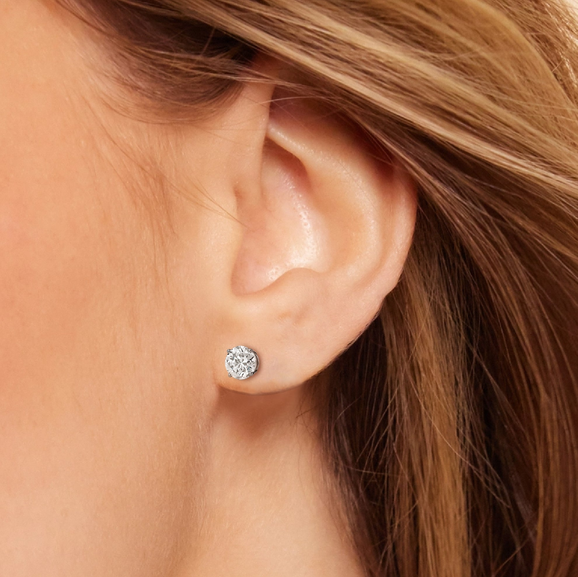 AGI Certified 2.50 CTW lab-grown diamond screw back stud earrings in 14K white gold with sparkling round diamonds.