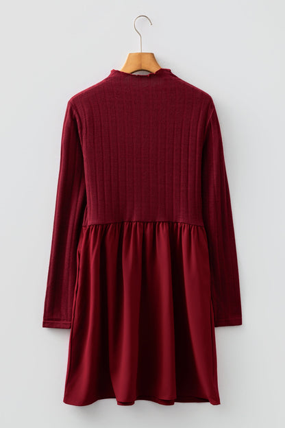 Byzantium Bay ribbed knit patchwork long sleeve dress with textured fabric and stylish design, shown on a model.