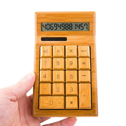 Fuchsia Molly solar-powered bamboo calculator with novelty design, featuring a compact, eco-friendly bamboo case and digital display.