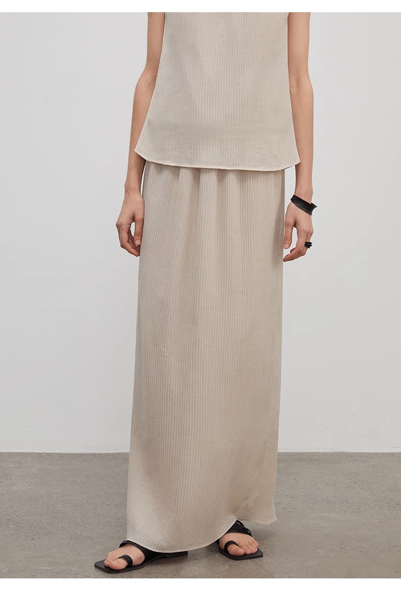 Brown Coeus high-density silk luxury skirt for women, shown with elegant drape and rich texture in a stylish high-end design.
