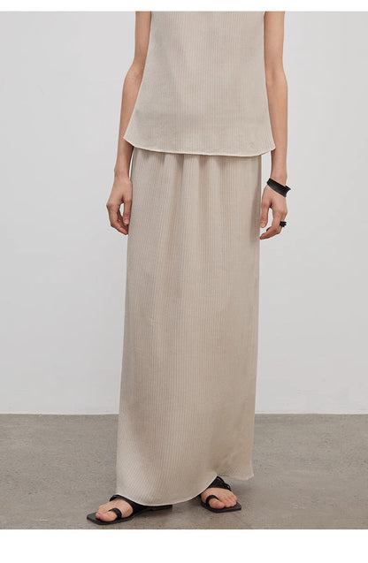 Brown Coeus high-density silk luxury skirt for women, shown with elegant drape and rich texture in a stylish high-end design.