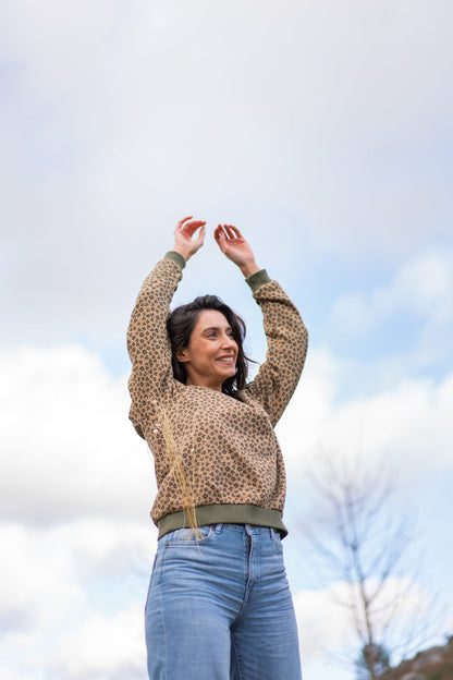Elegant Start2Finish blouse with matching accessories, shown on a hanger with a neutral background, showcasing stylish apparel details.