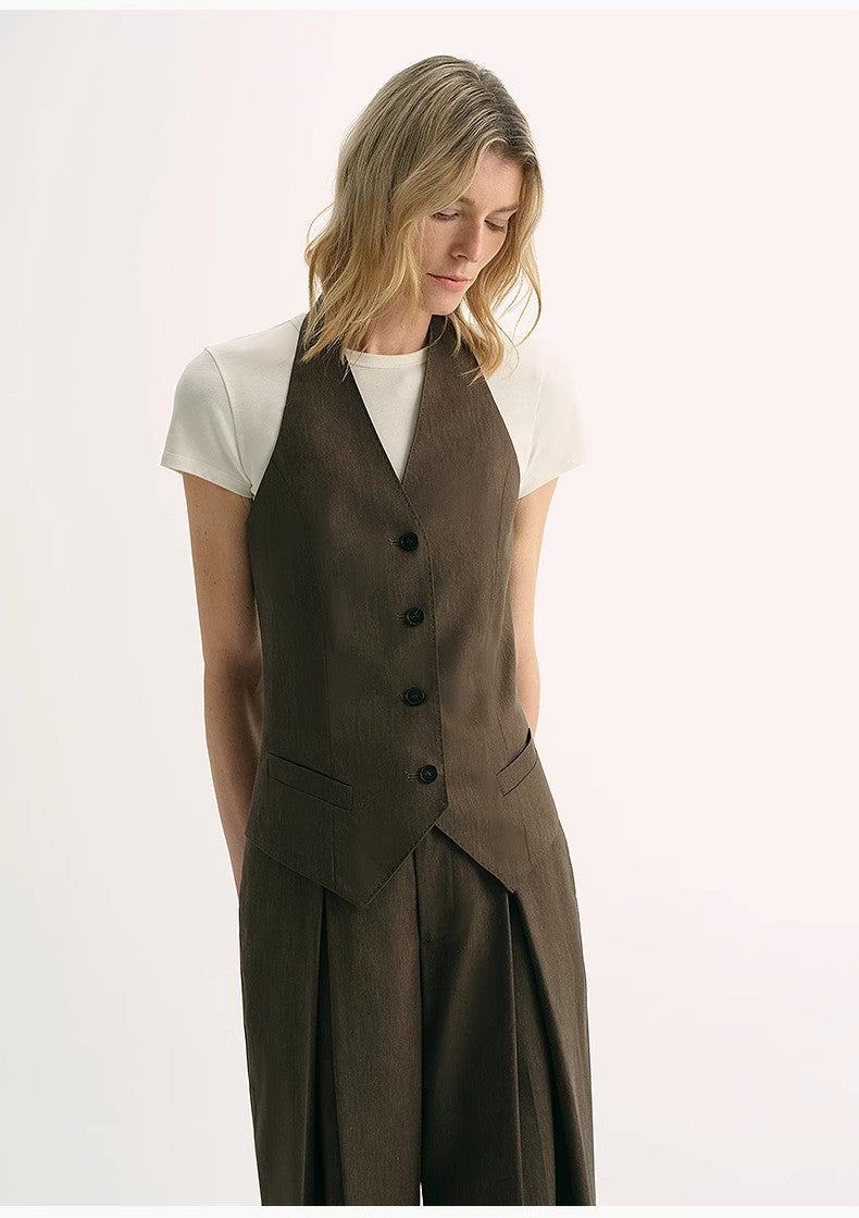 Brown Coeus silk linen halterneck sleeveless jacket featuring a classic old money style, cool and elegant for warm weather wear.
