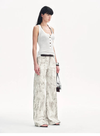 Brown Coeus Phantom snake print flared denim trousers, featuring original snake pattern and stylish fit, shown in the image.