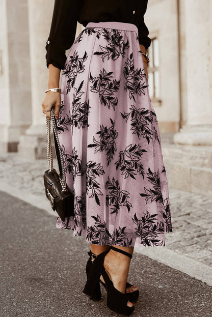 Peach blossom floral leaves embroidered high waist maxi skirt by Carmine Juneberry, flowing fabric with intricate floral embroidery.