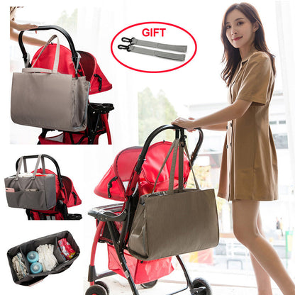 Maroon Asteria folding large capacity mother and baby bag with multiple compartments and adjustable straps, suitable for parenthood needs.