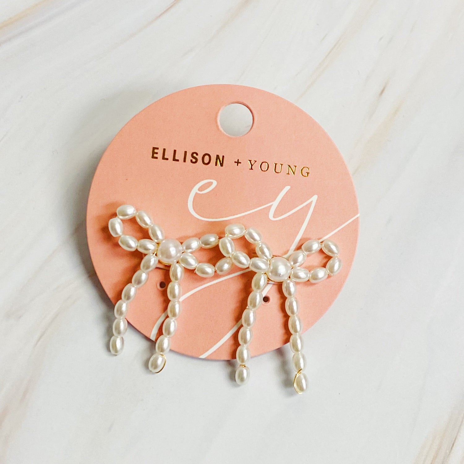 Fuchsia Hercules Pearl Bow Ballerina Earrings with white pearls and delicate bow design, crafted in jewelry and watches collection.