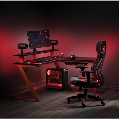 Start2Finish Avatar Battlestation L-shape gaming desk with carbon fiber top and matte red metal legs, modern computer workstation furniture.