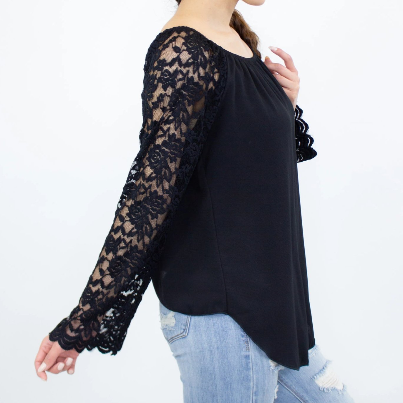 Black lace sleeve backless top from Yellow Hera, stylish blouse with elegant lace details and open back design.