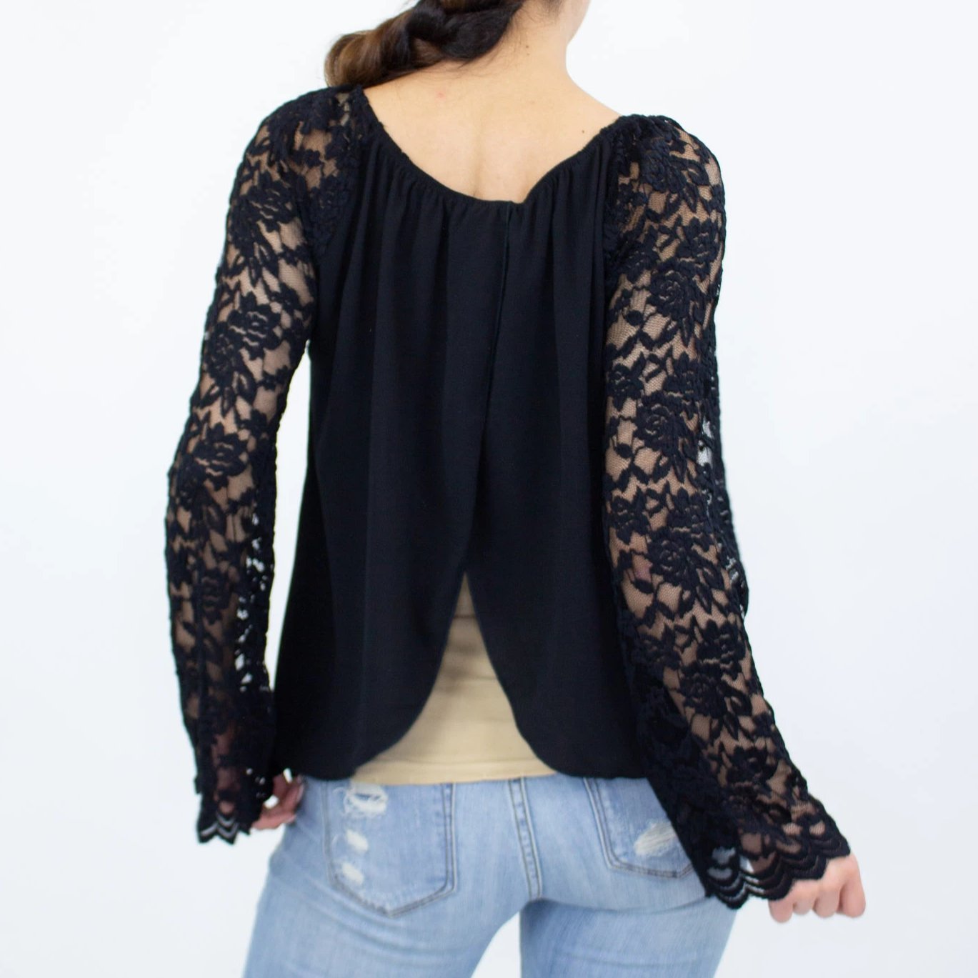 Black lace sleeve backless top from Yellow Hera, stylish blouse with intricate lace details and a backless design.