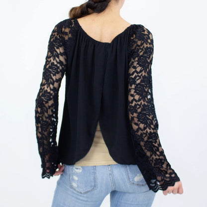 Black lace sleeve backless top from Yellow Hera, stylish blouse with intricate lace details and a backless design.