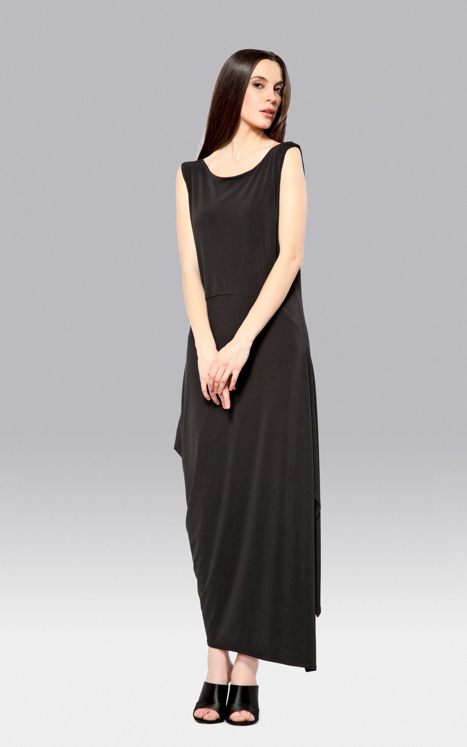 Black angled dress for women by Purple Mango, featuring a stylish cut and fit, displayed on a hanger.