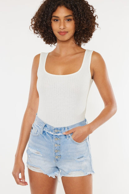Jade Icarus Kancan distressed button fly denim shorts featuring frayed edges and a classic denim wash.