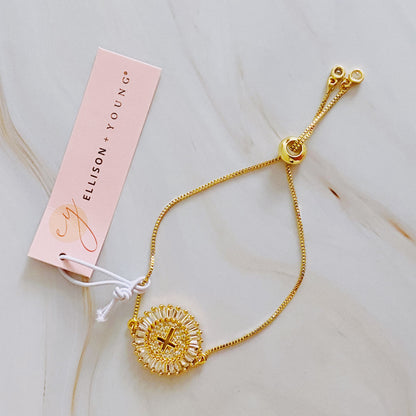 Fuchsia Hercules Mesmerized By The Cross Slide Bracelet featuring a silver-tone cross charm and adjustable chain for women.