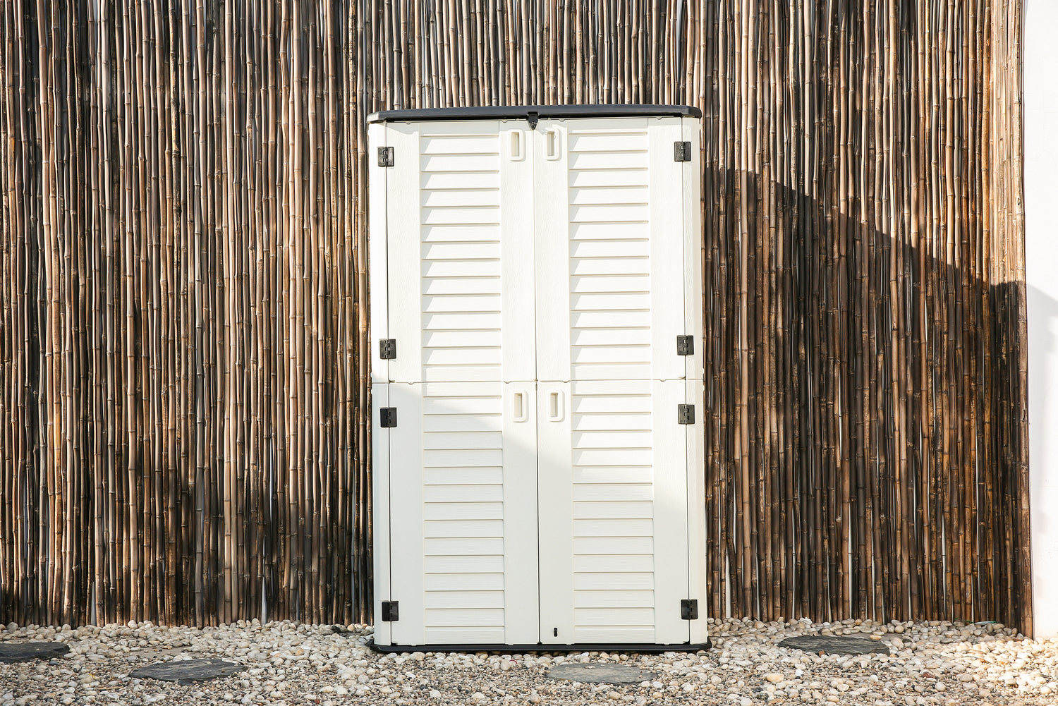 Emerald Thanatos Horti Cubic 66 cu. ft. outdoor vertical storage shed with organized shelving and durable construction for outdoor use.