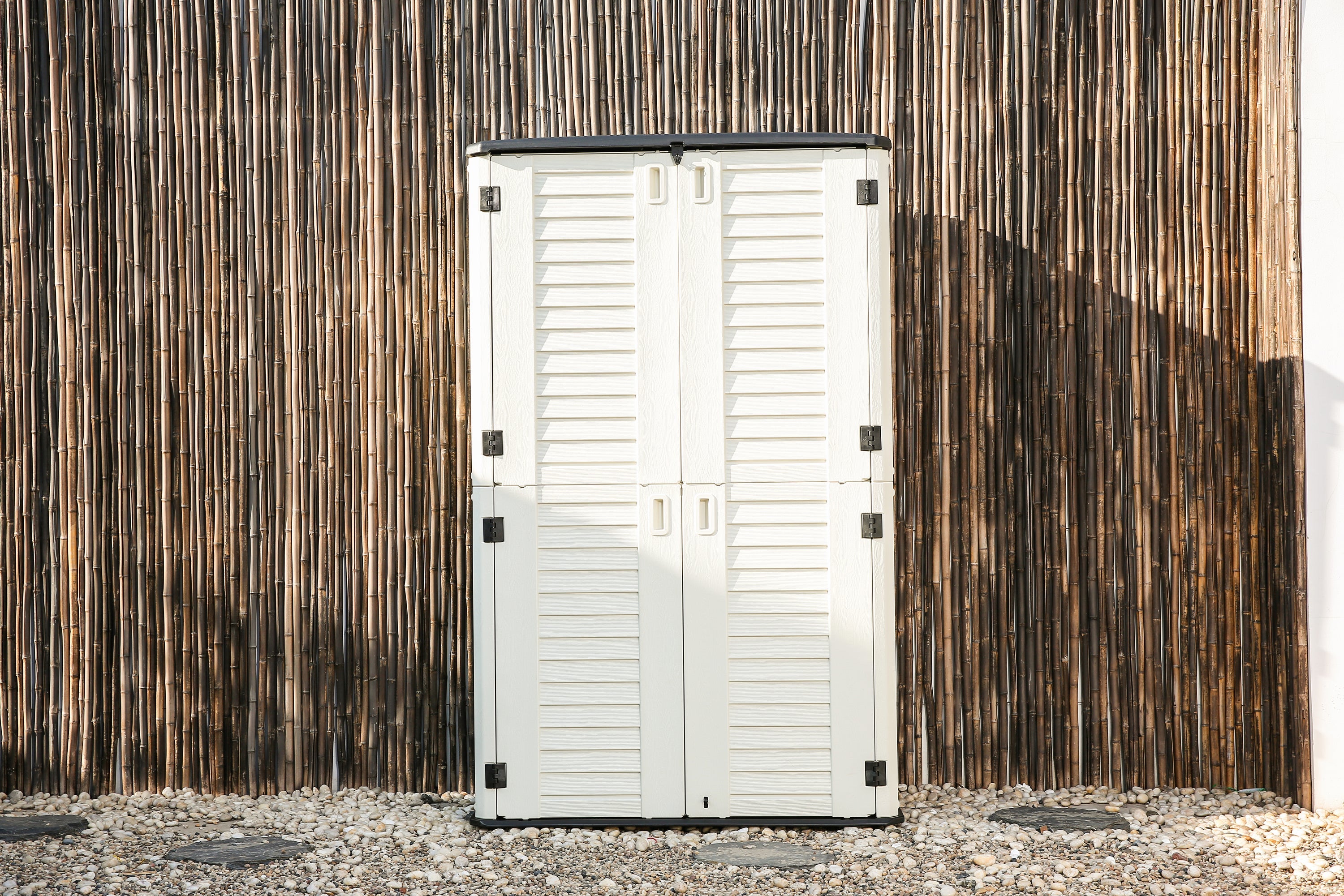 Emerald Thanatos Horti Cubic 66 cu. ft. outdoor vertical storage shed with organized shelving and durable construction for outdoor use.