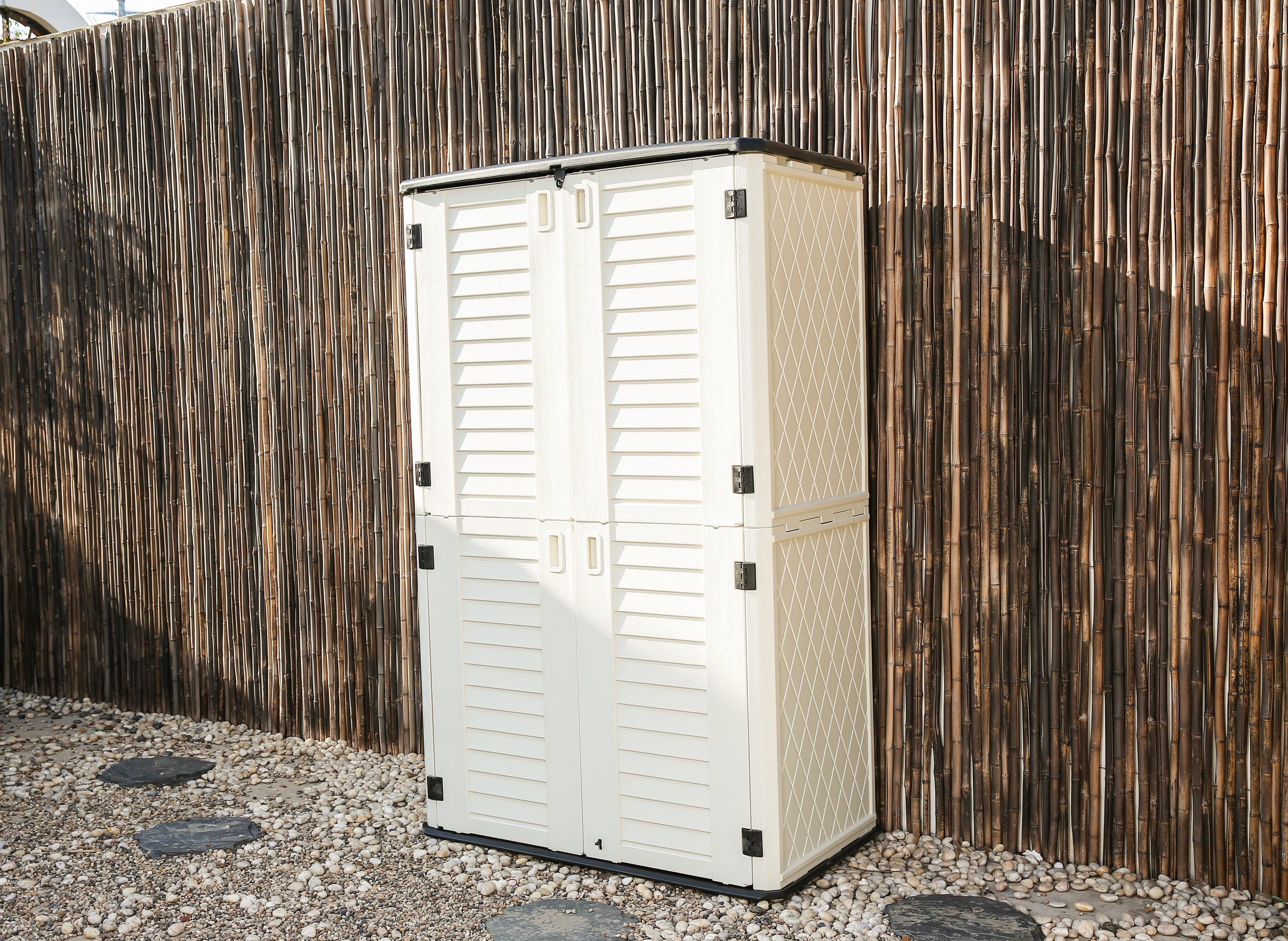 Emerald Thanatos Horti Cubic 66 cu. ft. outdoor vertical storage shed with organization compartments and durable exterior.