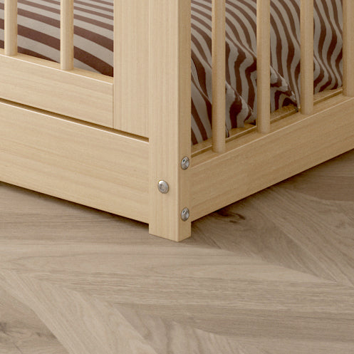Olive Lucy Dream Raft Montessori natural twin floor bed with wooden frame, minimalist design, and cozy bedding setup.