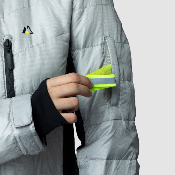 Gray EcoDown activewear jacket for women by Rose Hemera, featuring lightweight insulation and stylish, functional design.