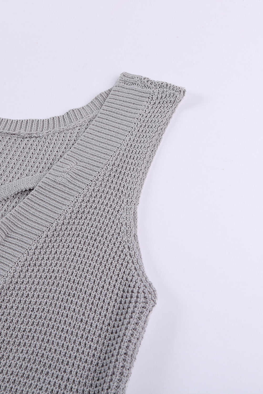 Gray crisscross hollow-out knit tank top for women by Lavender Pallas, featuring a stylish open knit design and sleeveless fit.