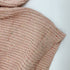 Carmine Juneberry SnuggleThread™ cotton knit baby sweater in soft pastel pink, featuring a cozy round neckline and ribbed cuffs.