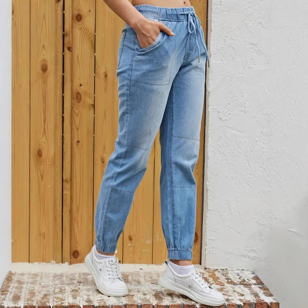 Korean-inspired high waist skinny jeans with elastic waistband from Carmine Juneberry, showcasing a fitted denim look.