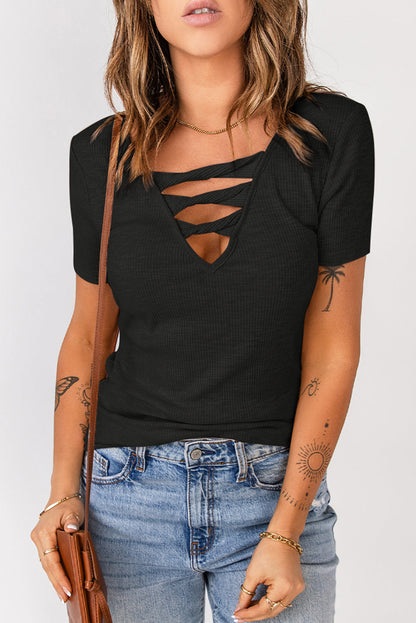 Black strappy hollow-out neck rib knit T-shirt by Harlequin Daisy, featuring a stylish open neckline and fitted ribbed fabric.