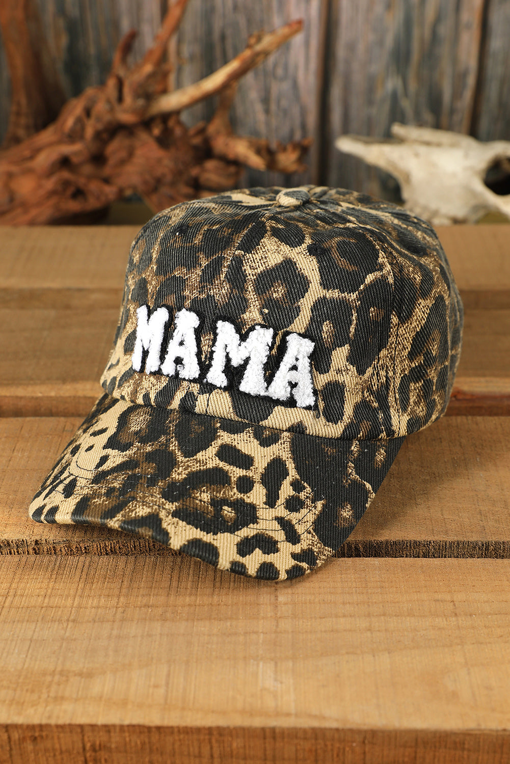 Leopard MAMA embroidered baseball cap by Carmine Juneberry featuring leopard print design and adjustable strap.
