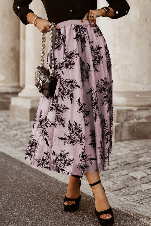Peach Blossom floral embroidered high waist maxi skirt by Carmine Juneberry, featuring delicate floral leaf patterns and flowing fabric.