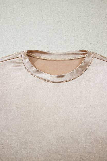 Metallic round neck tank top by Byzantium Bay, close-up view of the shiny, sleeveless top with a round neckline.