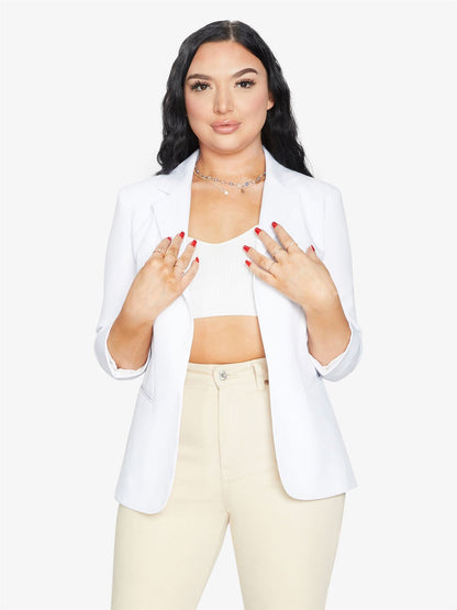 Rose Eleusis edge-to-edge blazer, stylish tailored jacket with sleek design, worn open showing lapel and long sleeves.