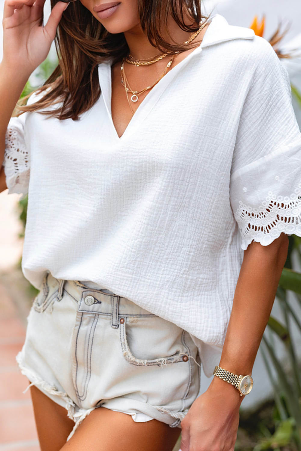 White crinkled lace splicing sleeve collared V-neck blouse by Carmine Juneberry, featuring delicate lace details and a stylish collar.