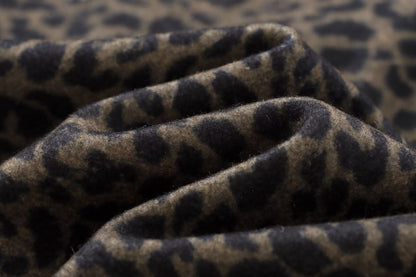 Carmine Juneberry leopard print statement coat from Haute Edition 25, stylish jacket with bold animal pattern and tailored fit.