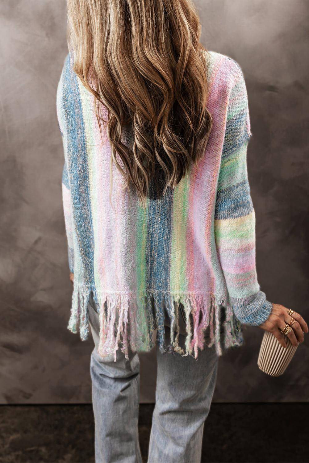 Purple color block fringed drop shoulder tunic sweater by Carmine Juneberry with a cozy, stylish design and textured fringed details.