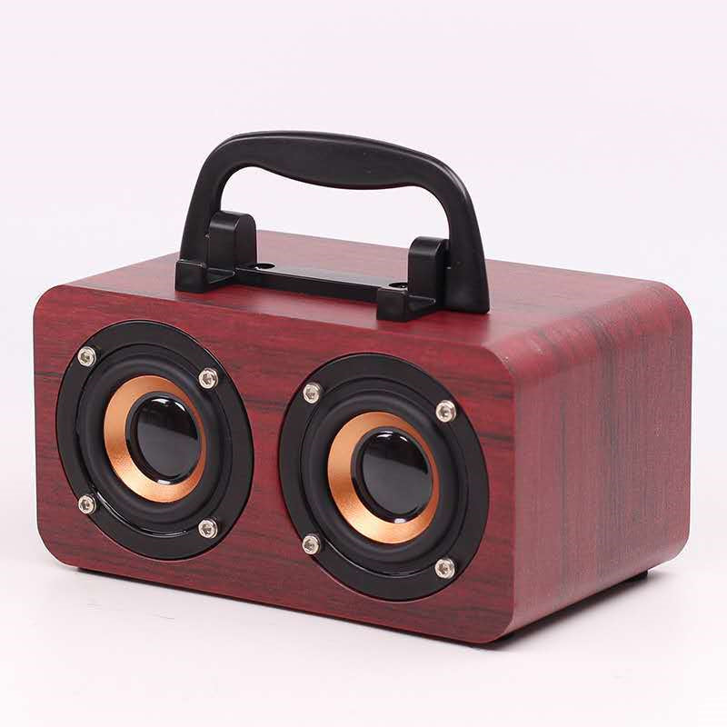 Maroon Asteria wooden wireless Bluetooth speaker for outdoor use, showing the portable design and natural wood finish.