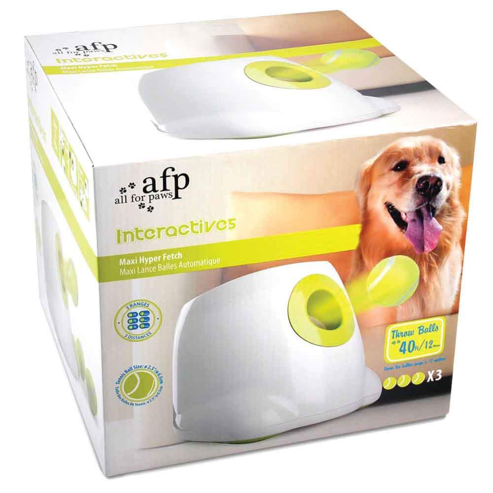 Ozdingo Hyper Fetch Maxi dog ball thrower in action, large interactive automatic pet toy launcher for dogs in a home garden setting.