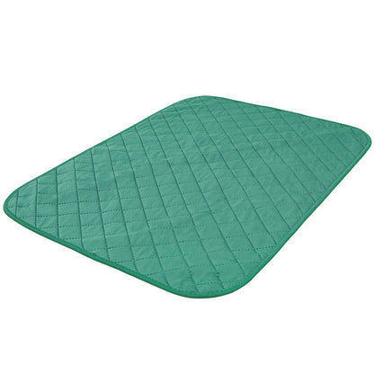 Natural bamboo fiber dog training pad by Maroon Asteria, designed for pets, placed on a soft bed or blanket.