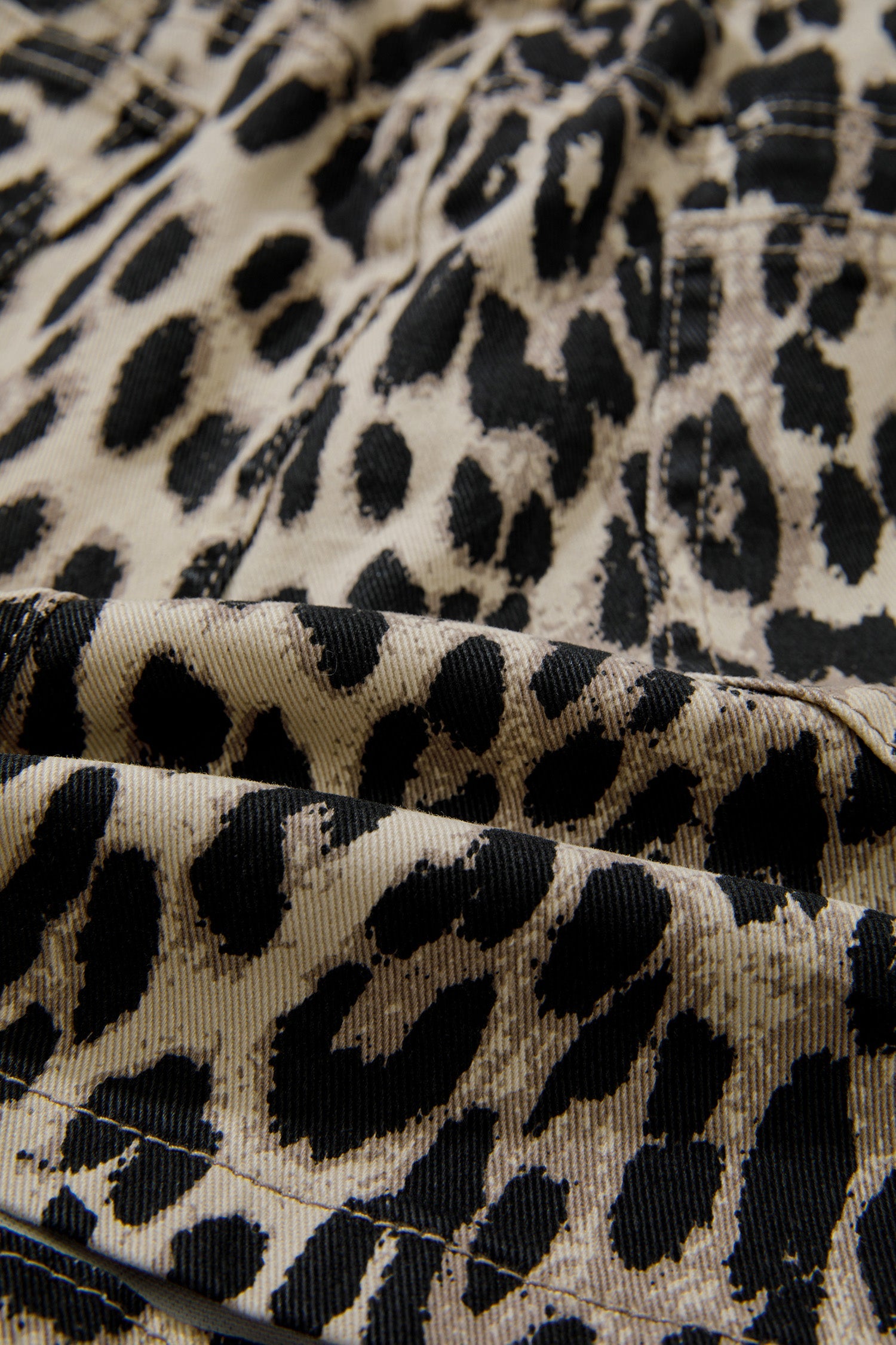Leopard print denim shorts for women with drawstring waist and elastic band by Byzantium Bay, casual summer fashion.