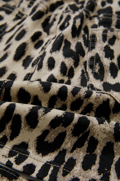 Leopard print denim shorts for women with drawstring waist and elastic band by Byzantium Bay, casual summer fashion.