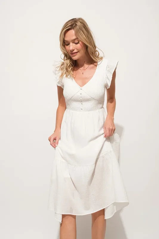 Pear Daisy ruffle sleeve front smocked tiered midi dress, lightweight and stylish, perfect for casual or semi-formal occasions.