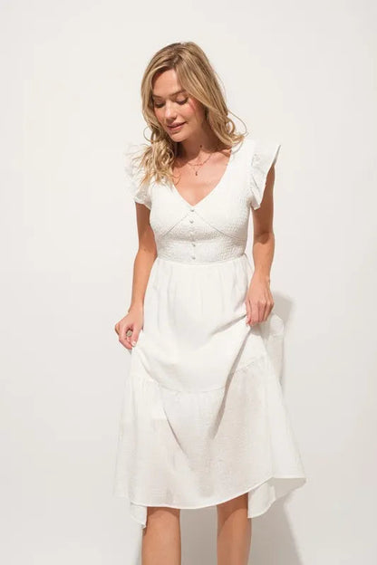 Pear Daisy ruffle sleeve front smocked tiered midi dress, lightweight and stylish, perfect for casual or semi-formal occasions.